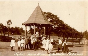 Drinking fountain with Victorian children posing